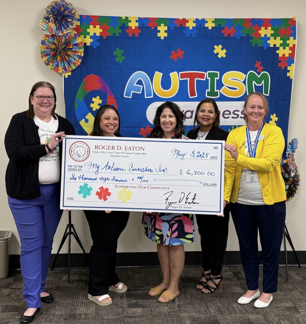 Clerk's Office donates to My Autism Connection Inc.